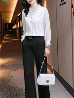 Felicia Elegant Ruffled Long-Sleeve Blouse