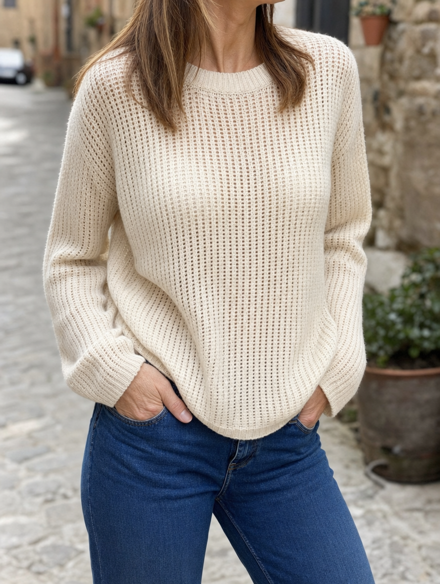 Calder Open Weave Knit Sweater in cream worn with jeans, front view