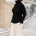Harlow Roll Neck Sweater in black, side view