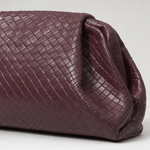Close-up of the woven surface on the Everley Pouch Clutch