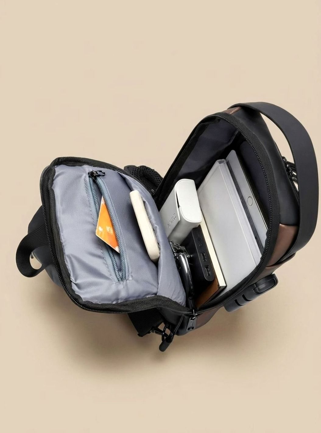 Thomas Water-Resistant Sling Bag with USB Charging Port
